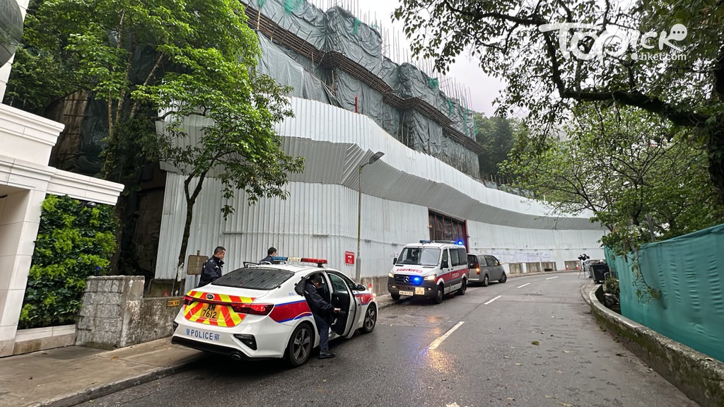山頂白加道工人從高處墮下，昏迷送院搶救。（黃傑偉攝）